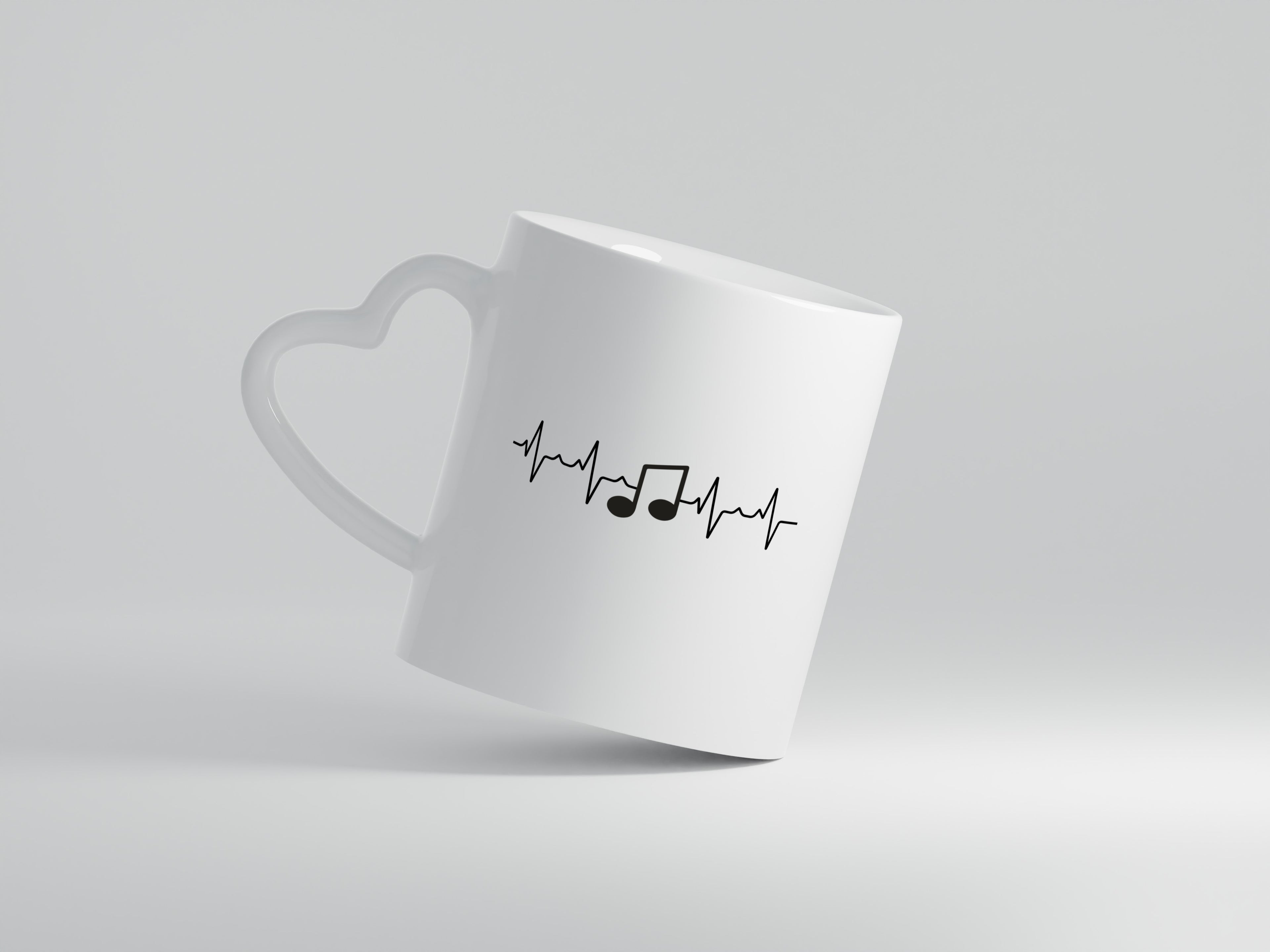 Musiknote Herzschlag | Motiv Note | Musik | Musiker - Herzhenkel Tasse - Kaffeetasse / Geschenk / Familie