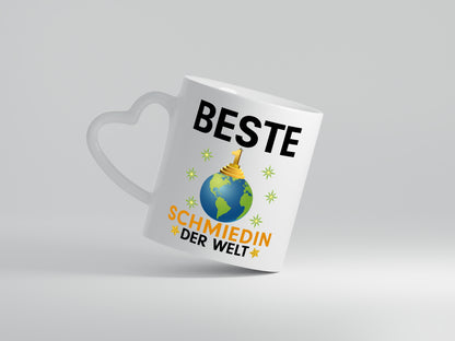 Welt Beste Schmiedin | Schmied | Beruf Schmiederei - Herzhenkel Tasse - Kaffeetasse / Geschenk / Familie