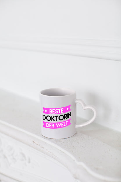 Beste Doktorin | Doktorand | Doktortitel - Herzhenkel Tasse - Kaffeetasse / Geschenk / Familie