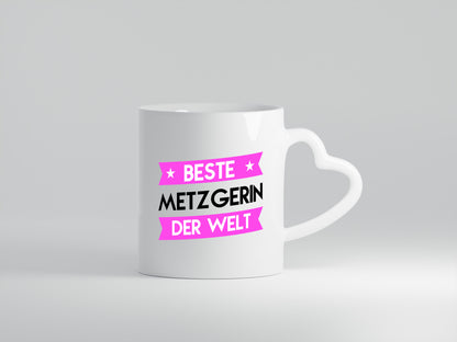 Beste Metzgerin | Fleischerin - Herzhenkel Tasse - Kaffeetasse / Geschenk / Familie