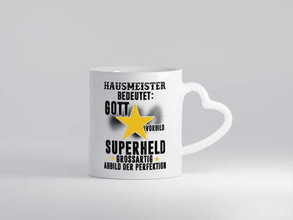 Bedeutung von Hausmeister | Hauswart - Herzhenkel Tasse - Kaffeetasse / Geschenk / Familie