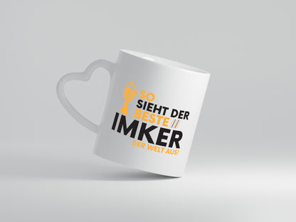 Der Weltbeste Imker | Imkerei - Herzhenkel Tasse - Kaffeetasse / Geschenk / Familie