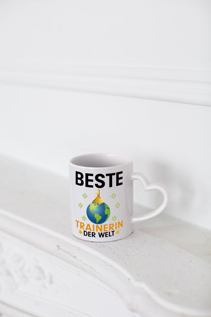 Welt Beste Trainerin | Sportverein | Humor - Herzhenkel Tasse - Kaffeetasse / Geschenk / Familie