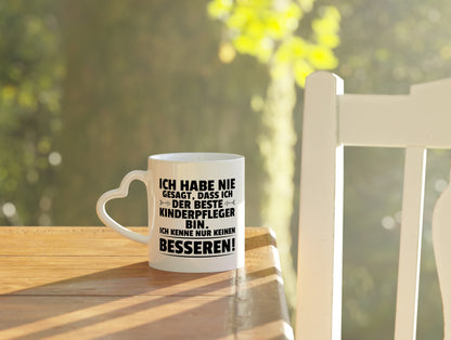 Der Beste Kinderpfleger | Pfleger | Kinder | Pflegeberuf - Herzhenkel Tasse - Kaffeetasse / Geschenk / Familie