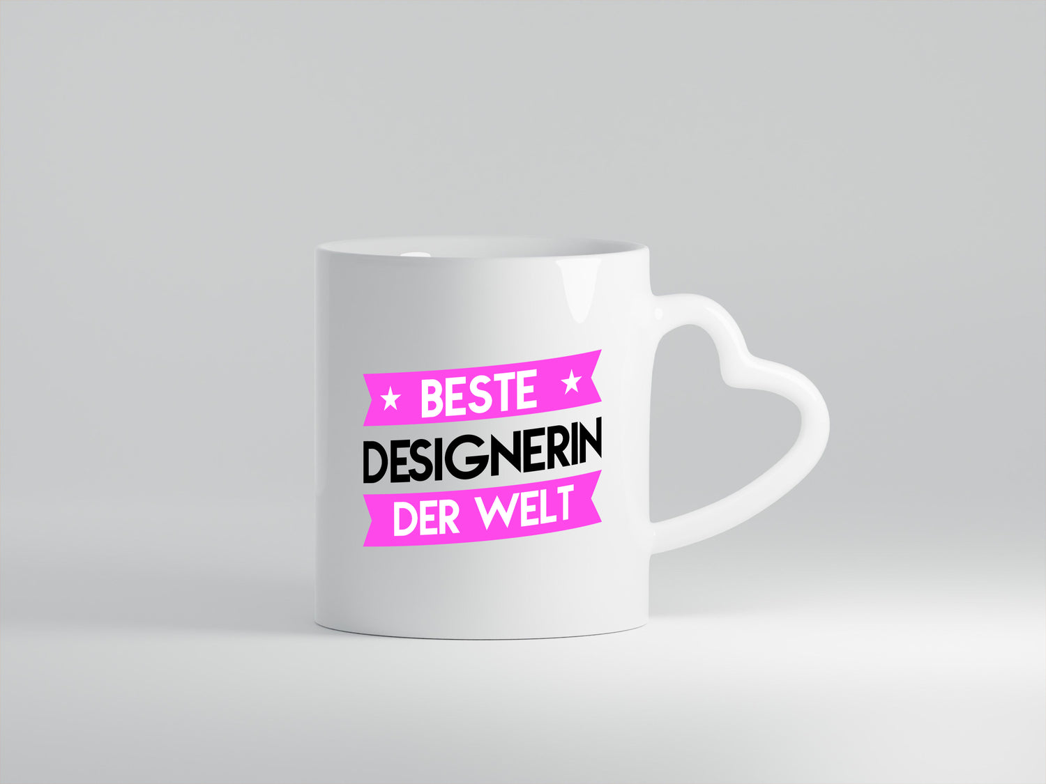 Beste Designerin | Mode - Herzhenkel Tasse - Kaffeetasse / Geschenk / Familie