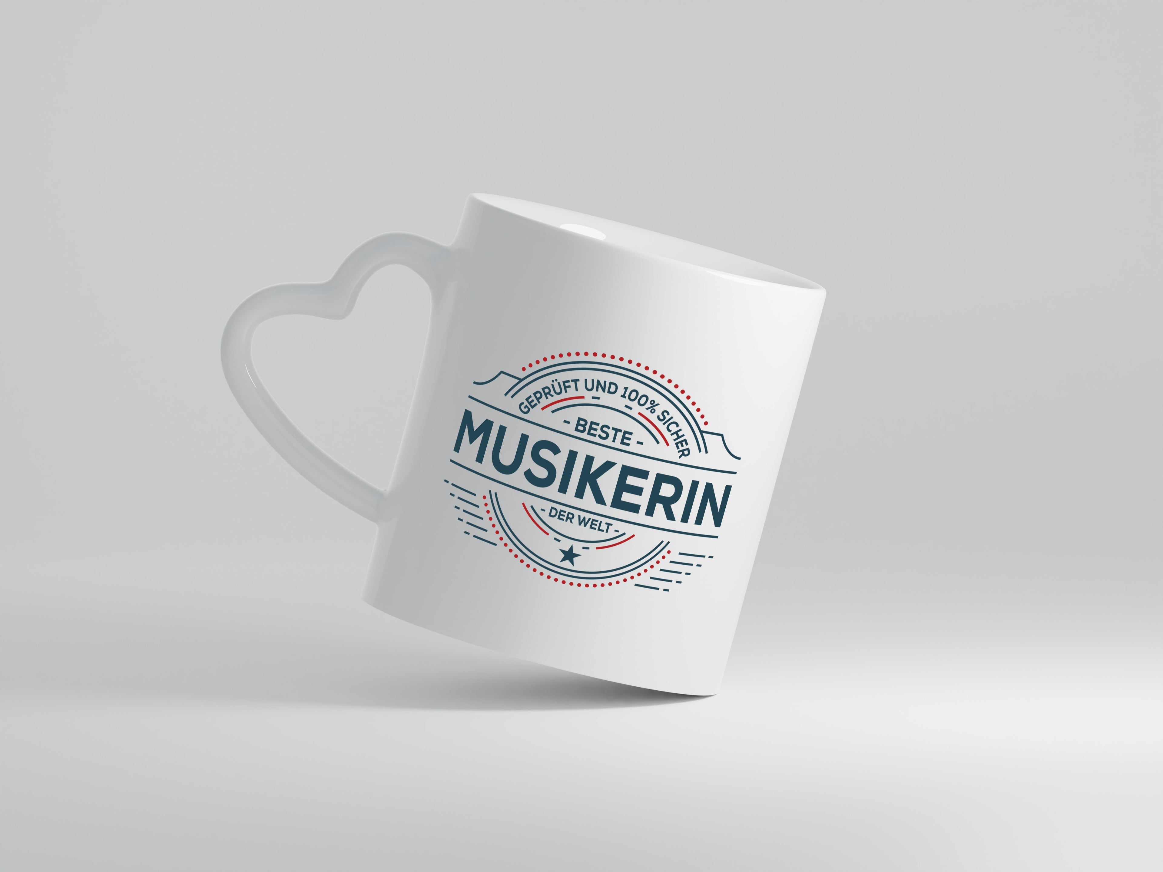 Geprüft und sicher: Musikerin | Musik | Musikantin - Herzhenkel Tasse - Kaffeetasse / Geschenk / Familie