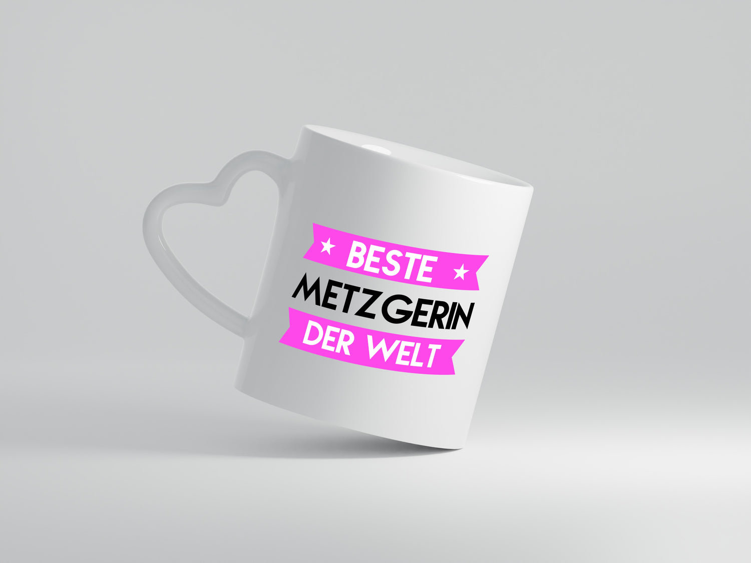 Beste Metzgerin | Fleischerin - Herzhenkel Tasse - Kaffeetasse / Geschenk / Familie