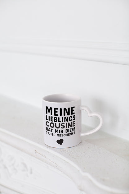 Lieblingscousine | Cousine Tasse | Cousinen Humor - Herzhenkel Tasse - Kaffeetasse / Geschenk / Familie